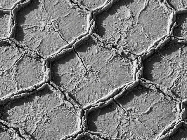 Hexagonal Pattern With Cracked Earth Texture