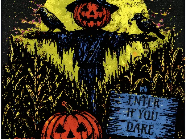 Halloween Scarecrow In Pumpkin Field